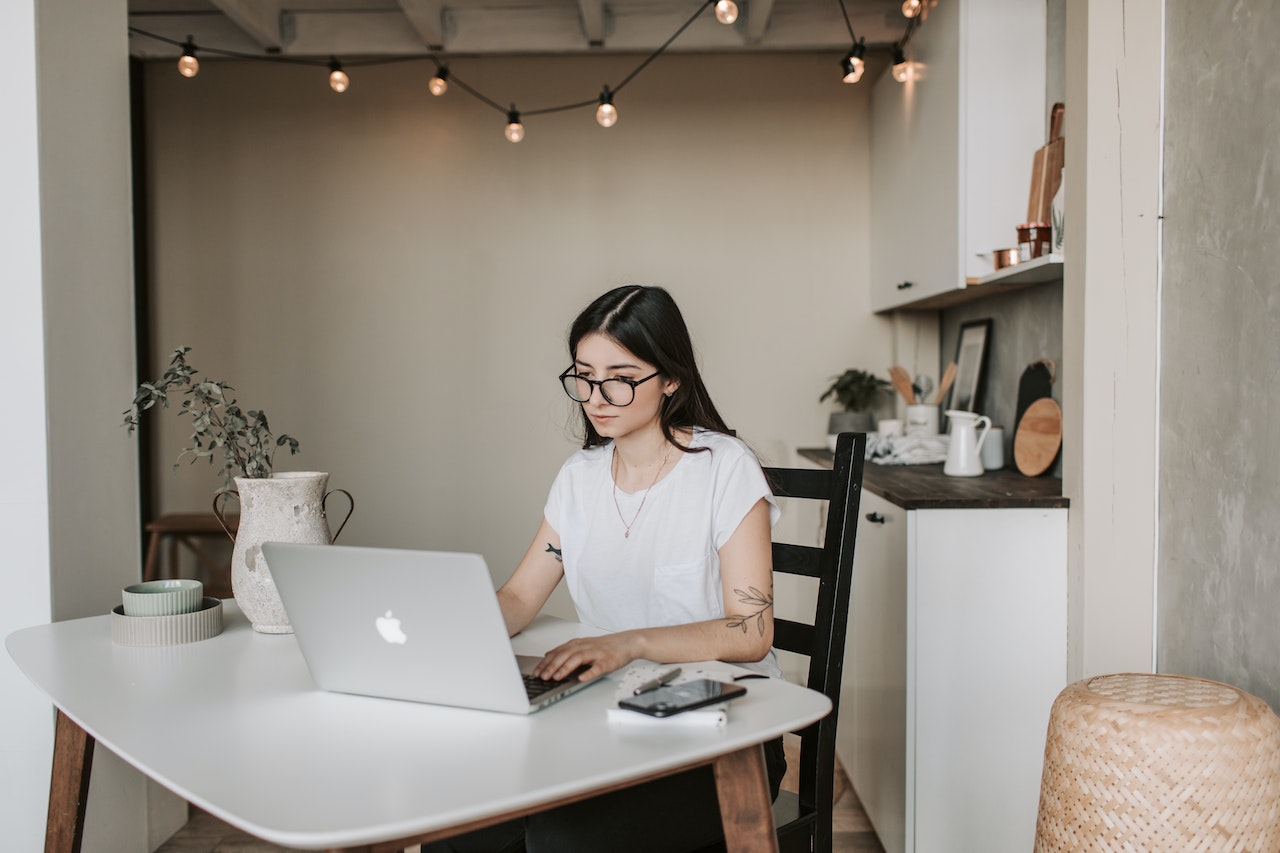 women working from home on laptop