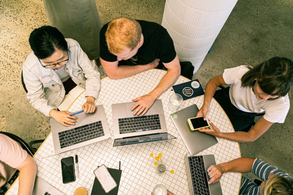 group of people working in a marketing office