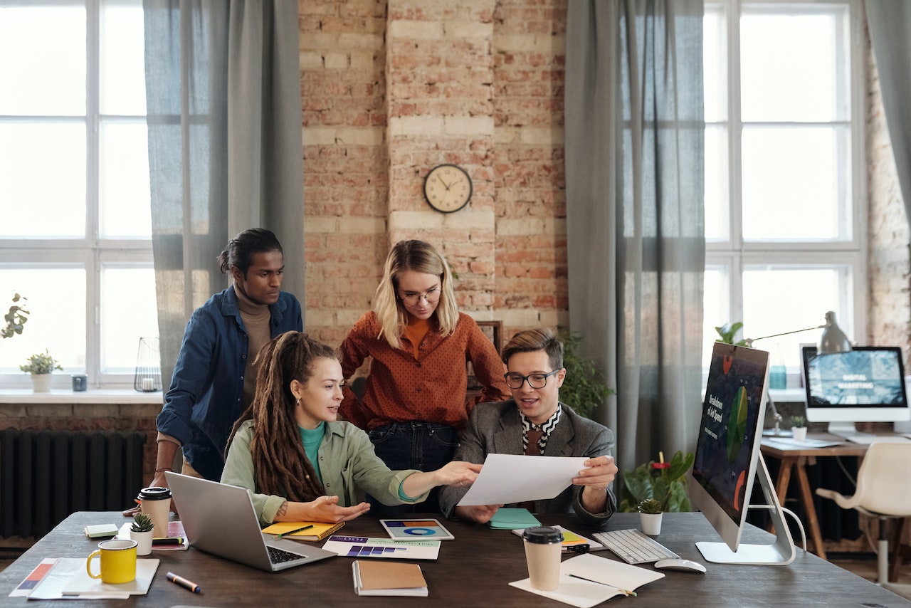 group of people in marketing office working together